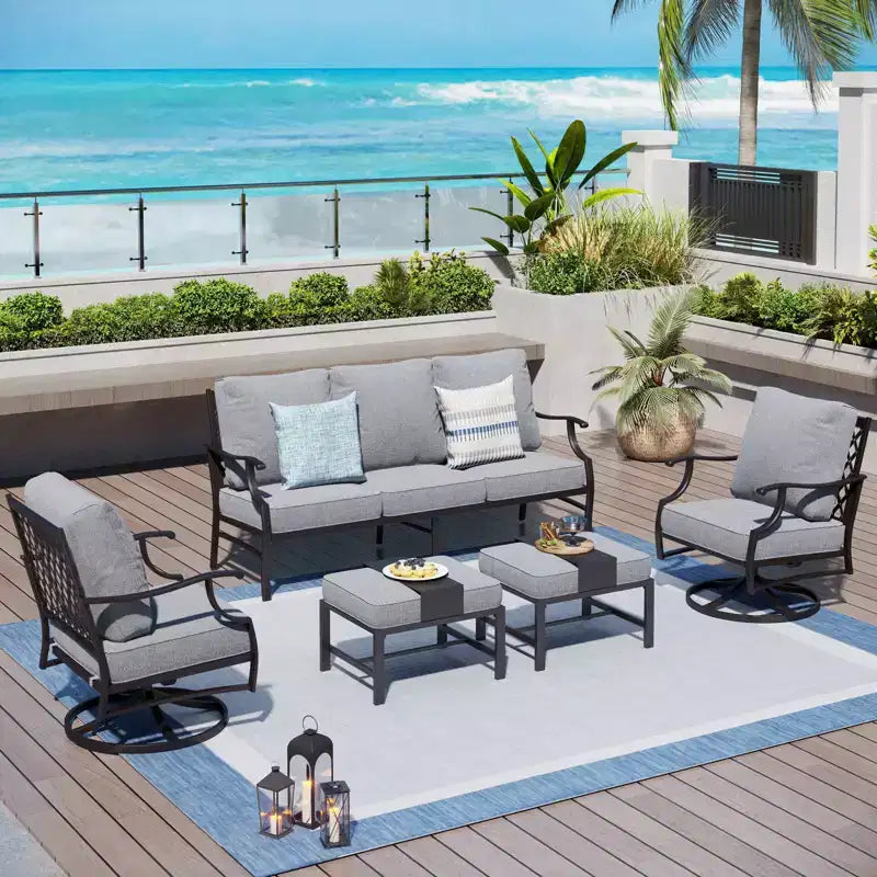 Ensemble de conversation d'extérieur 5 pièces Captiva Designs en métal avec chaises pivotantes à dossier grillagé et poufs