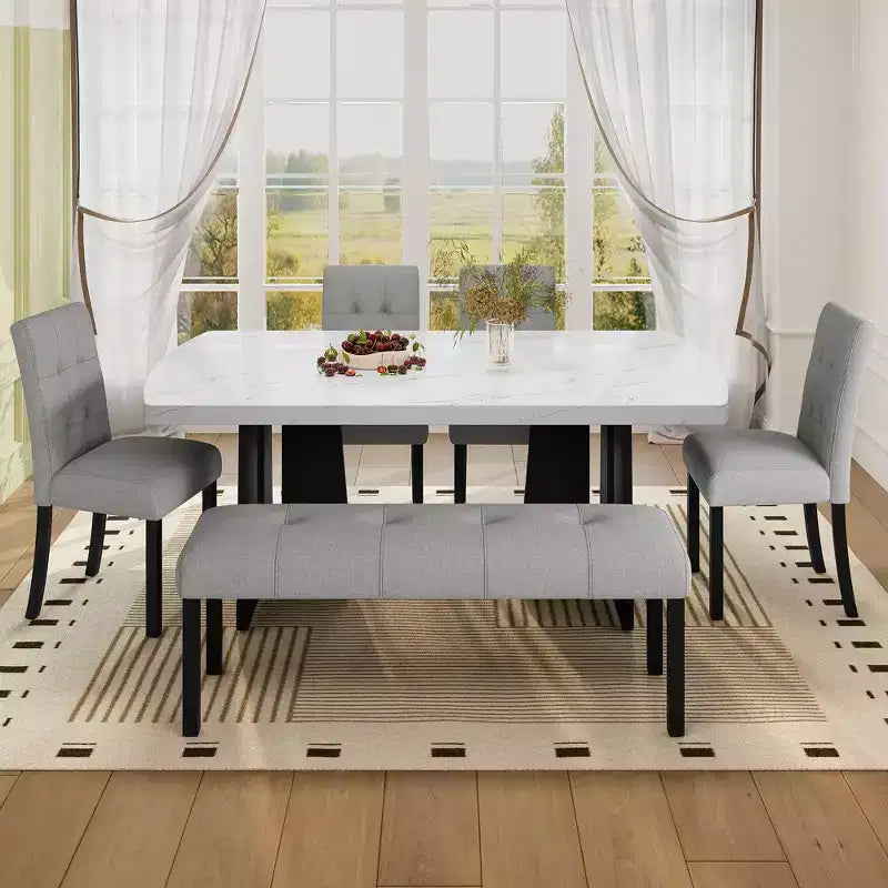 Ensemble de salle à manger moderne 6 pièces Griffin de GDFStudio avec table en faux marbre de 63 po, 4 chaises et 1 banc